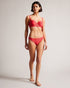 SHANEES-Swimwear-Get ready to make a splash with our SHANEES bikini bottom. With full coverage, you'll feel confident whether you're lounging poolside or taking a dip in the ocean. This versatile bottom can be mixed and matched with your favourite tops, or worn with the matching piece.The fabric of this product is made with 78% recycled polyamide. Using recycled polyamide helps divert plastic waste from ending in landfills. Bikini bottom Solid colour Full coverage Ted Baker logo hardware Matching bikini top